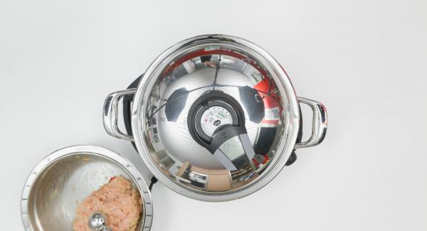 Coprire la Padella Arcobaleno con il coperchio e posizionarla sul fornello a calore alto. Con l'ausilio di Audiotherm riscaldare fino alla finestra "carne".
